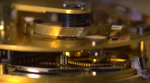 Close up of an Earnshaw watch movement showing cogs and spring Stock Footage
