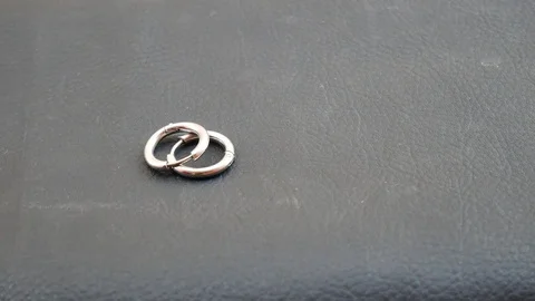 Close up earrings on black background. Stock Footage 129377093