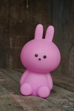 Close up Easter bunny rabbit statuette. Easter egg hunt in the garden. Select Stock Photos