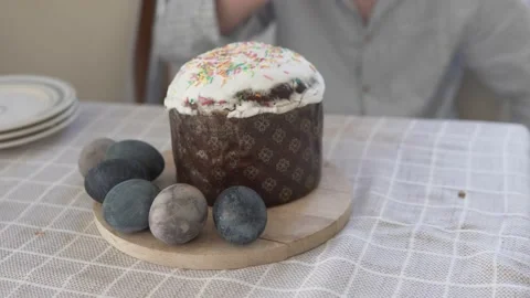 Close-up of Easter cake and painted eggs at the morning table Stock Footage 238802753
