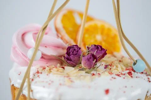 Close-up of an Easter cake. Dried oranges and roses on top of the cake Stock Photos