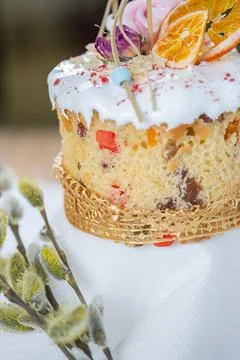 Close-up of an Easter cake. Dried oranges and roses on top of the cake Stock Photos