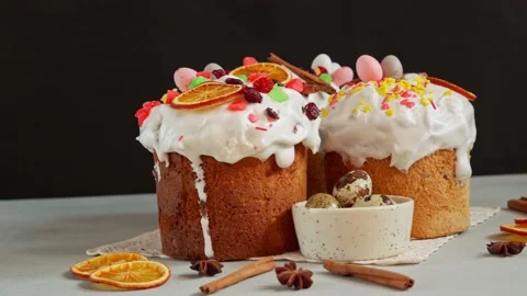 Close up of Easter Cakes decoreted with dried Fruits on Grey Background Stock Footage 236855268