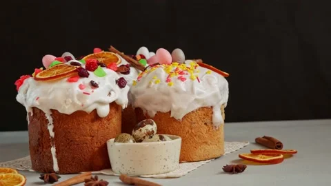 Close up of Easter Cakes decoreted with dried Fruits on Grey Background Stock Footage 236855285