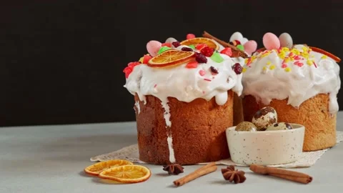 Close up of Easter Cakes decoreted with dried Fruits on Grey Background Stock Footage 236855291