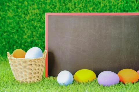 Close up Easter eggs and blackboard mockup Stock Photos