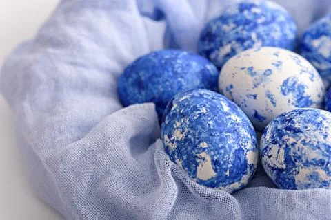 Close-up of Easter eggs in the color of the year-classic blue with gradient e Stock Photos