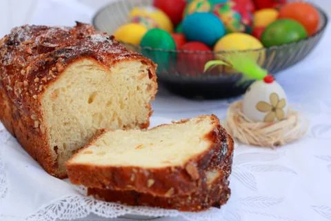 Close-up of Easter table with bread and painted eggs Stock Photos