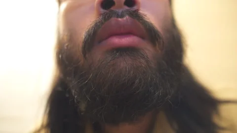 Close up eating chips bearded man Видео 101221455