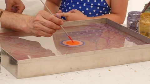 Close up of Ebru art/paper marbling Stock Footage 112005125