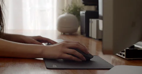 Close up of editor's hand using mouse Stock Footage 131113619