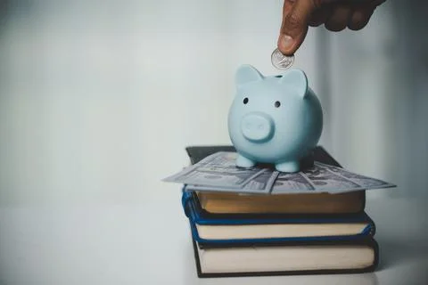 Close-up education object with stack money coin-cash dollar and glass jar on Stock Photos