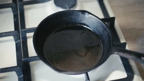Close Up of Egg Dropped on Hot Pan. Slow Motion. Stock Footage 104977748