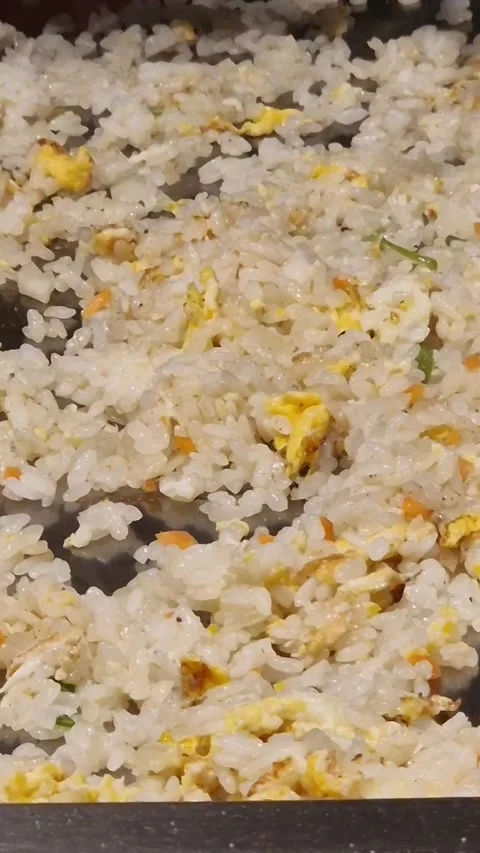 Close Up Of Egg Fried Rice Being Cooked At A restaurant, London, UK Stock Footage 280774575