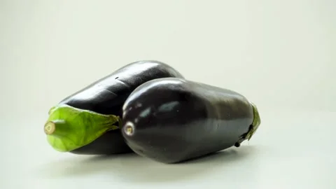 Close-Up Of Eggplant Rotating On The White Background 스톡 동영상 236203003
