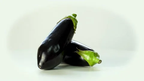 Close-Up Of Eggplant Rotating On The White Background 스톡 동영상 236203026