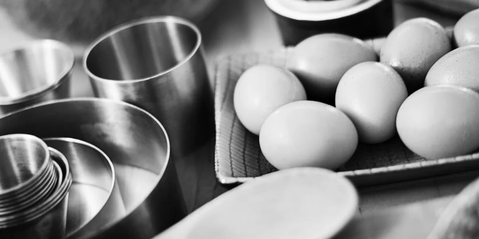 Close up of eggs and kitchen stuff Stock Photos