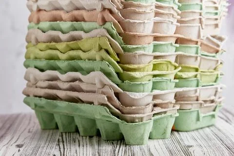 Close up of eggs containers. Recycled, zero waste, new life, natural lifestyle Stock Photos