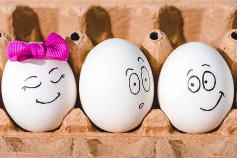 Close eggs smiling shocked face Stock Photos