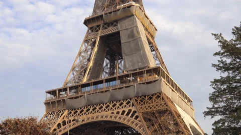 Close up on the Eiffel Tower a day of october in Paris, France in october Stock Footage 223664165