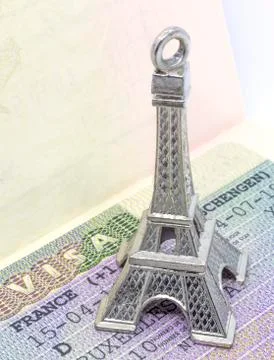 Close up of the Eiffel tower keychain on the Schengen visa allowing the passp Stock Photos