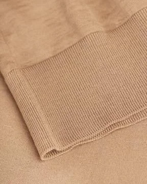 Close-Up of Elastic Hem on beige Wool Turtleneck Stock Photos