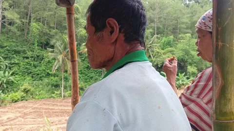 Close-up of an elderly Asian farmer. Stock Footage 321933171