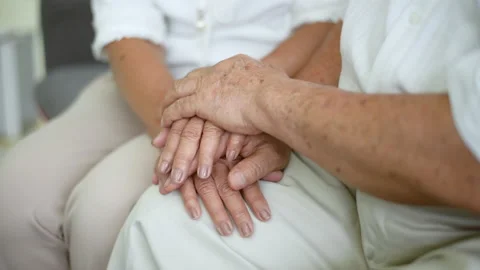 Close up of elderly hands holding each other Stock Footage 137047813
