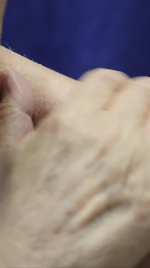 Close-Up Of Elderly Hands Showing Care And Warmth. Vertical.   Stock-Footage 284841198