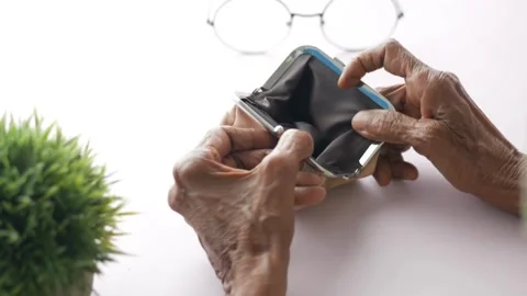 Close-up of elderly man hand opening wallet purse retirement ruin bankruptcy old Stock Footage 336450575
