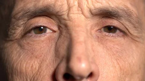 Close-up. the elderly man stared at the camera Stock Photos