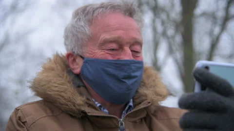 Close on Elderly Man Video Call Stock Footage 150952620