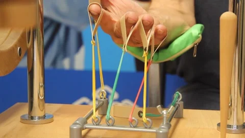 Close-up of an elderly man's hand is engaged in rehabilitation exercises hand Stock Footage 143205914