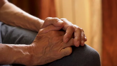 Close-up of an elderly man's hands expressing excitement Stock Footage 249891701