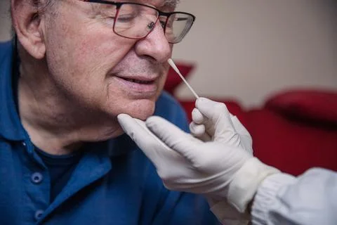 Close-up of an elderly patient being tested for covid-19 with a molecular s.. Stock Photos