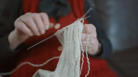 Close Up of Elderly Woman Knitting a Wool Sock by Hand 스톡 동영상 334085327