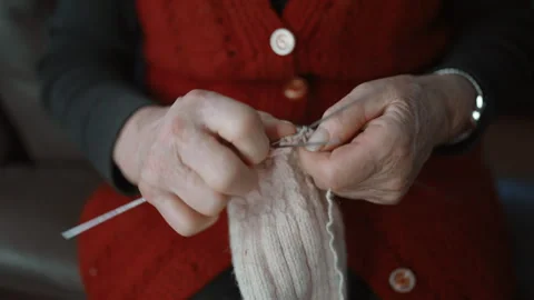 Close Up of Elderly Woman Knitting Wool Socks by Hand 스톡 동영상 334085364