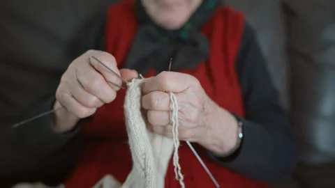 Close Up of Elderly Woman Knitting Wool Socks by Hand 스톡 동영상 334106979