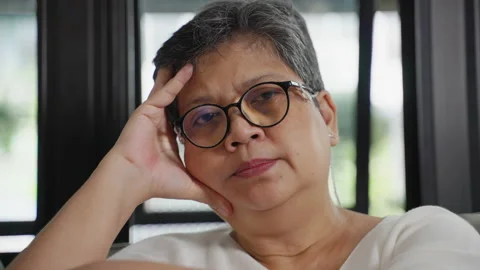 Close-up of an elderly woman's face in a sad and lonely mood Stock-Footage 162050893