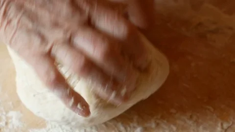 Close up of elderly woman's hand kneading Stock Footage 84196088