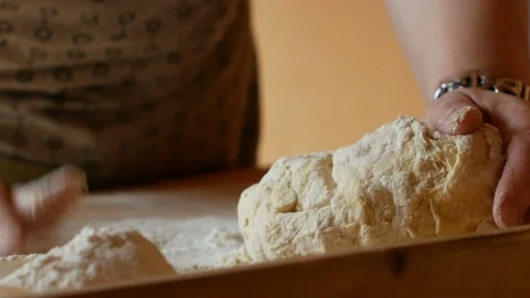 Close up of elderly woman's hand kneading Stock Footage 112875726
