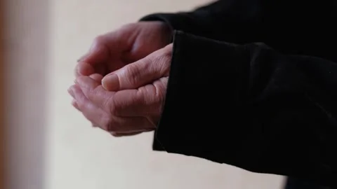 Close-up of an elderly woman's outstretched hands begging for alms Video stock 320416911