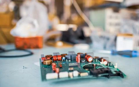 Close-up electric green embedded microcircuits in production 写真素材