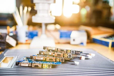 Close-up electric green embedded microcircuits in production 库存照片