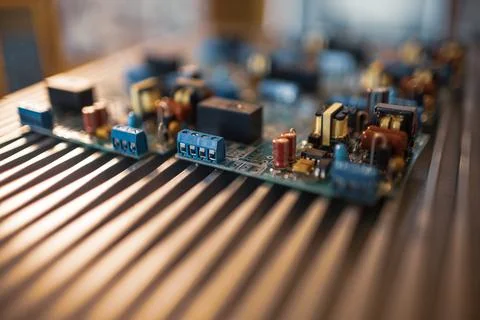 Close-up electric green embedded microcircuits in production Stock Photos