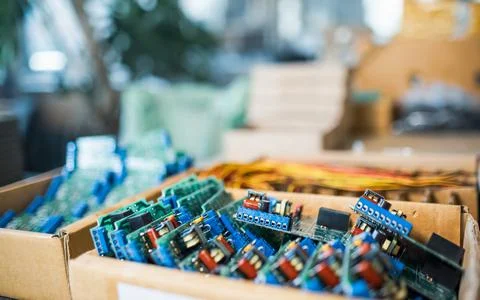 Close-up electric green embedded microcircuits in production Stock Photos