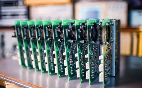 Close-up electric green embedded microcircuits in production 스톡 사진