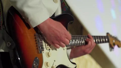 Close-up of an electric guitar playing during a cover bands performance. Close Video stock 320117254