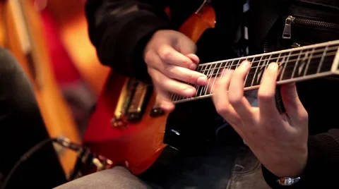 Close up of electric guitar playing Stock Footage 54978154