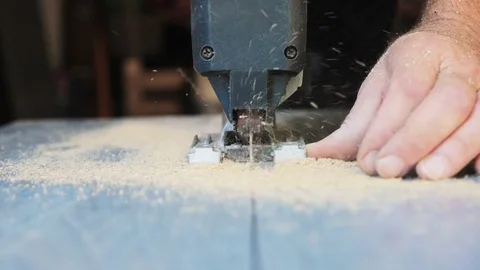 Close-up of electric jigsaw in action Stock Footage 79028517